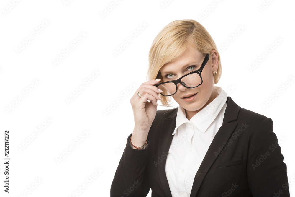 Beautiful blonde adult businesswoman dressed in black stylish suit with eyeglasses before white background Beautiful blonde adult businesswoman dressed in black stylish suit with eyeglasses before white background
