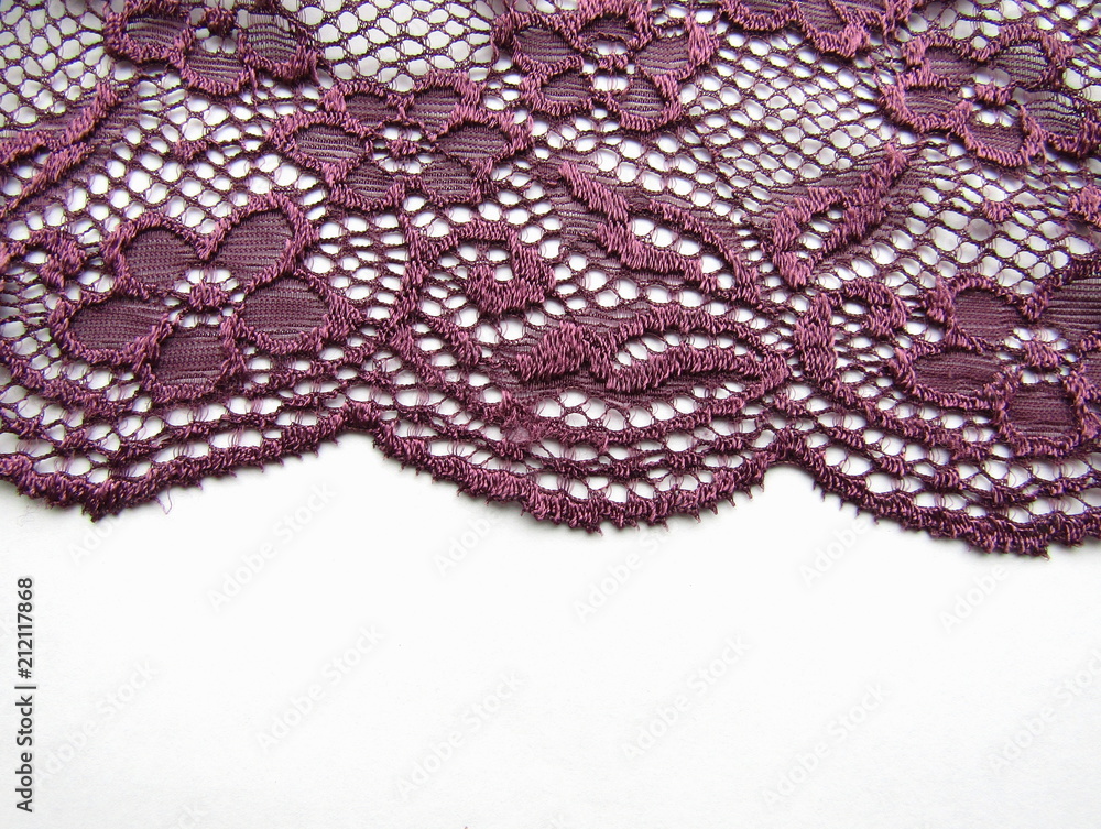 Obraz premium Dark lace fabric with festoons on white background