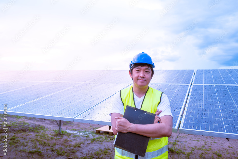 Engineer work job on site checking solar cell panels new alternative electric energy Engineer work job on site checking solar cell panels new alternative electric energy