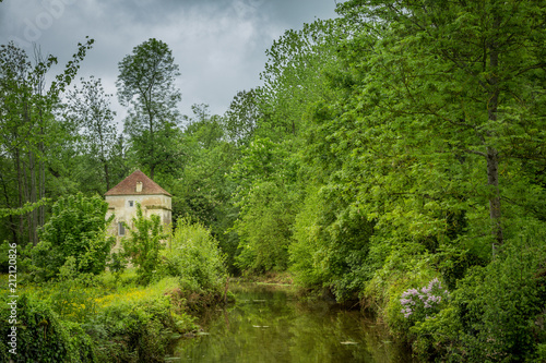 Stone house on the banks of the river Serein, Noyers sur Serein, Burgundy, France
