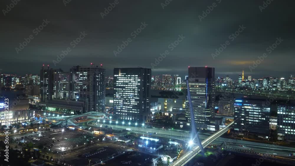 Aerial view over Tokyo by night - beautiful city lights - TOKYO / JAPAN - JUNE 12, 2018 Aerial view over Tokyo by night - beautiful city lights - TOKYO / JAPAN - JUNE 12, 2018