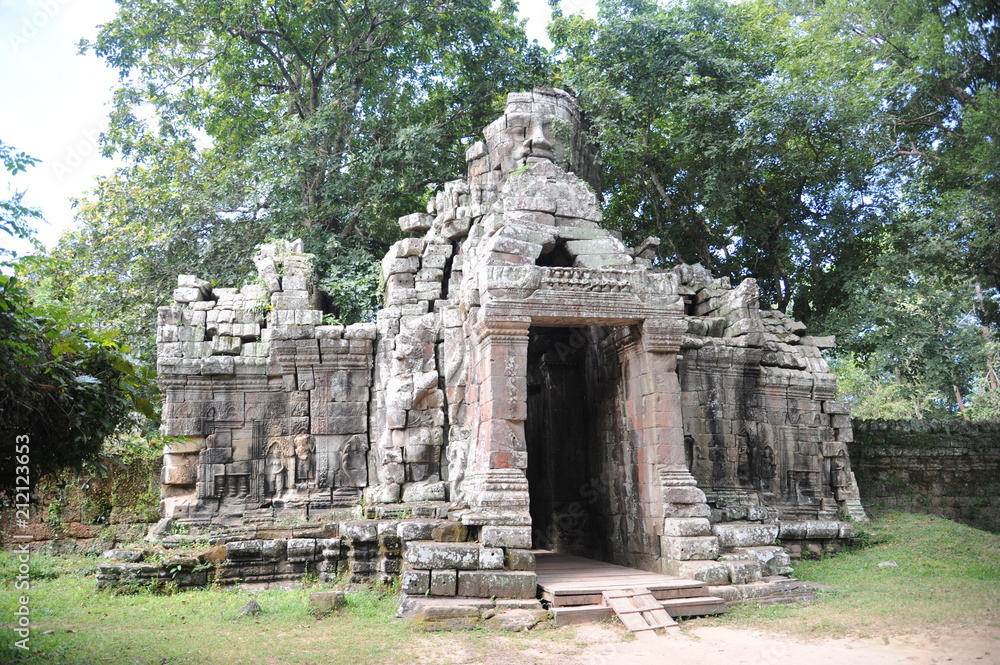 The Bayon is a well-known and richly decorated Khmer temple at Angkor in Cambodia. Built in the late 12th or early 13th century as the official state temple of the Mahayana Buddhist King Jayavarman VI