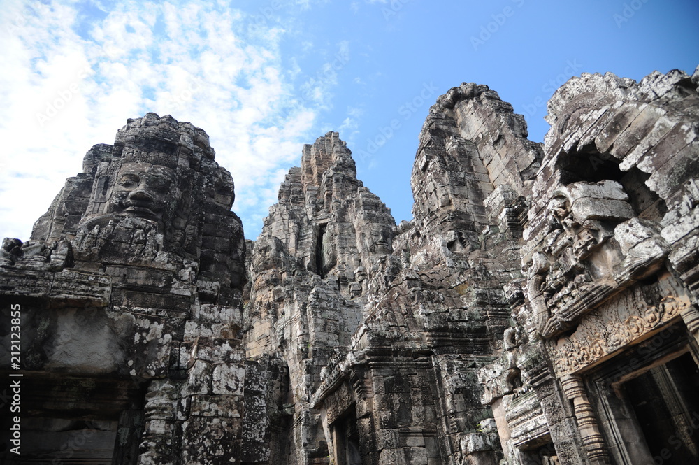 The Bayon is a well-known and richly decorated Khmer temple at Angkor in Cambodia. Built in the late 12th or early 13th century as the official state temple of the Mahayana Buddhist King Jayavarman VI