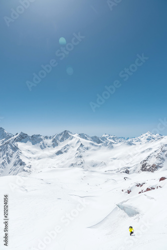 Winter snow covered mountain peaks in Caucasus. Great place for winter sports photo