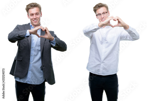 Wallpaper Mural Young handsome blond business man wearing different outfits smiling in love showing heart symbol and shape with hands. Romantic concept. Torontodigital.ca