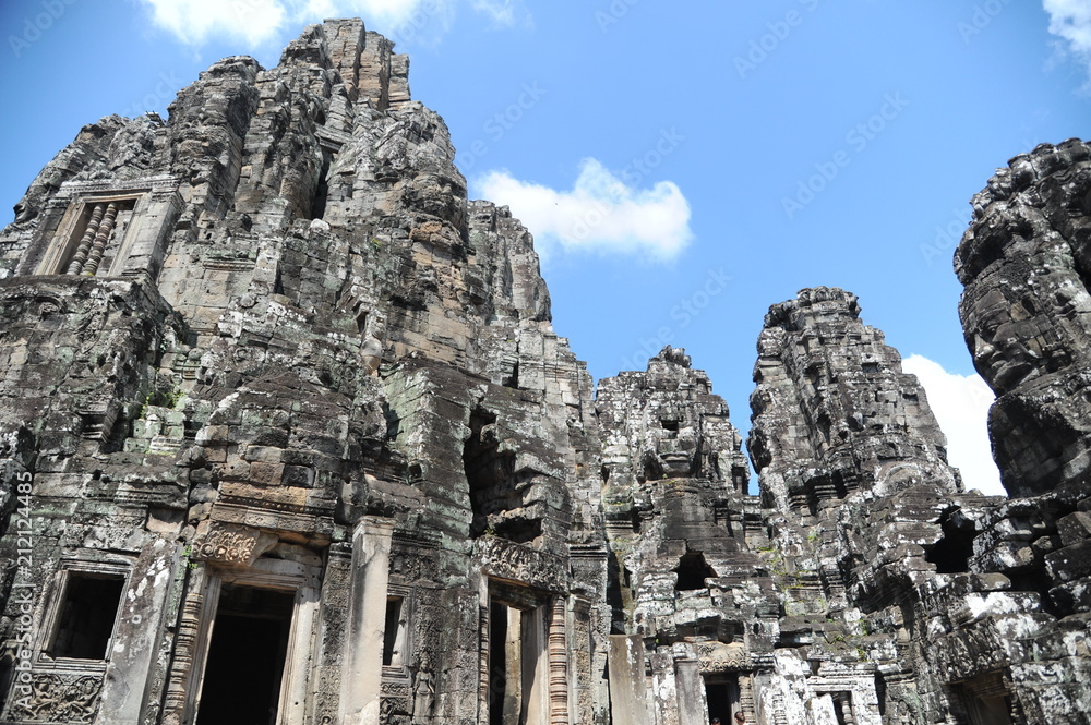 The Bayon is a well-known and richly decorated Khmer temple at Angkor in Cambodia. Built in the late 12th or early 13th century as the official state temple of the Mahayana Buddhist King Jayavarman VI