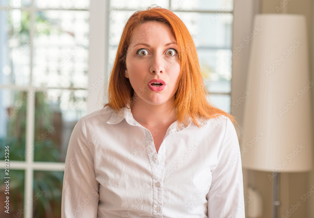 Set of red-haired girl scared face expression isolated on white
