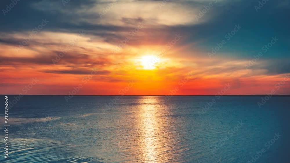 Panorama of sea sunset, ocean sunrise, seascape. Beautiful serene scene. Nature landscape. Holidays, travel, vacation. Water waves movement and clouds in sky float. 4K Slow Motion Time Lapse Parallax Panorama of sea sunset, ocean sunrise, seascape. Beautiful serene scene. Nature landscape. Holidays, travel, vacation. Water waves movement and clouds in sky float. 4K Slow Motion Time Lapse Parallax