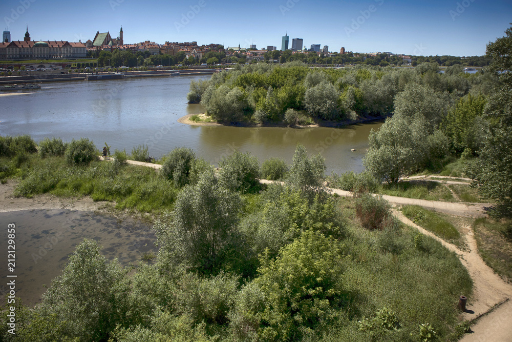 City over the river. Warsaw over the Vistula. The old town is the Polish and Viennese Boulevards. High-rise buildings and historic City over the river. Warsaw over the Vistula. The old town is the Polish and Viennese Boulevards. High-rise buildings and historic