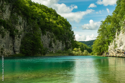 View of a rocky valley with the cloudy sky in the background, beautiful natural views. Photograph taken in the plitvice lakes natural park in croatia.