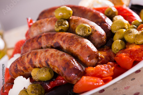 Grilled sausages and vegetables