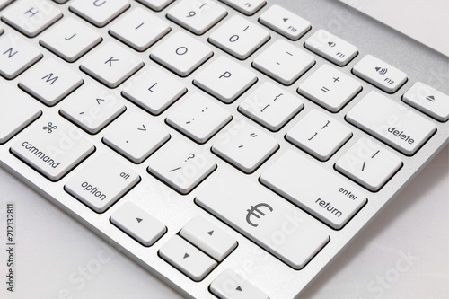White  keyboard with green € "EURO" key. British £ "Pound" key.