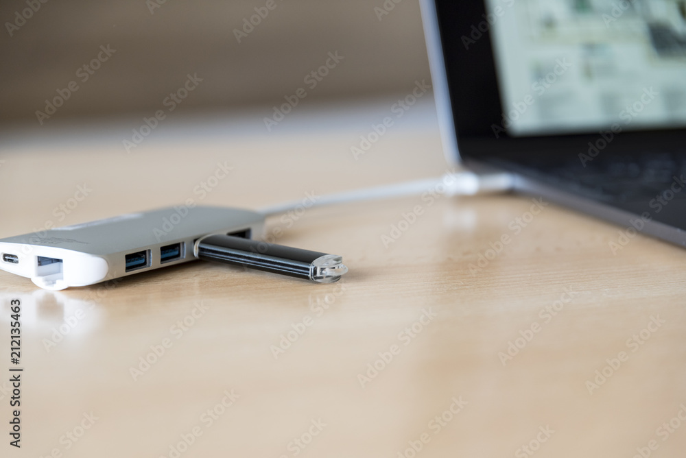 USB adapter with a USB flash drive and Type-C connector installed in a laptop USB adapter with a USB flash drive and Type-C connector installed in a laptop