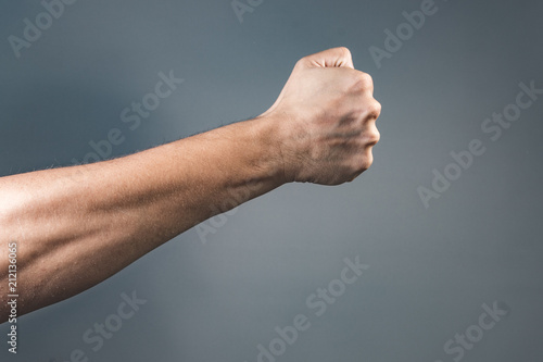 Hand showing side view of a fist