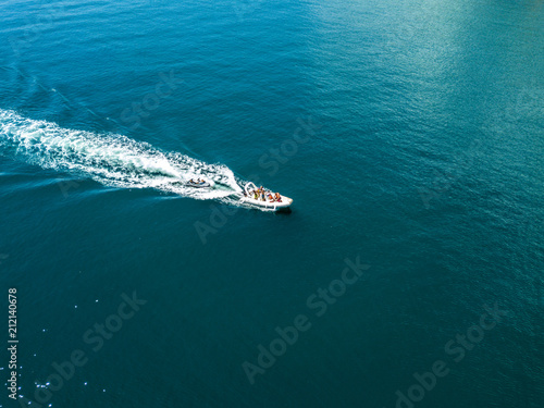 top above view of motor fast boat on a water surface isolated © Mihail