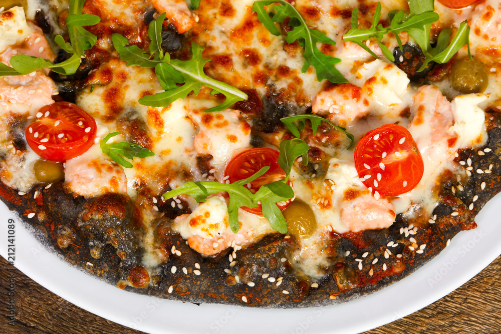 Pizza with salmon and mozzarella Pizza with salmon and mozzarella