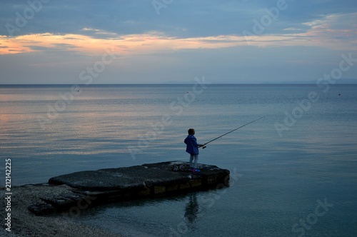 fisherman on the coast 