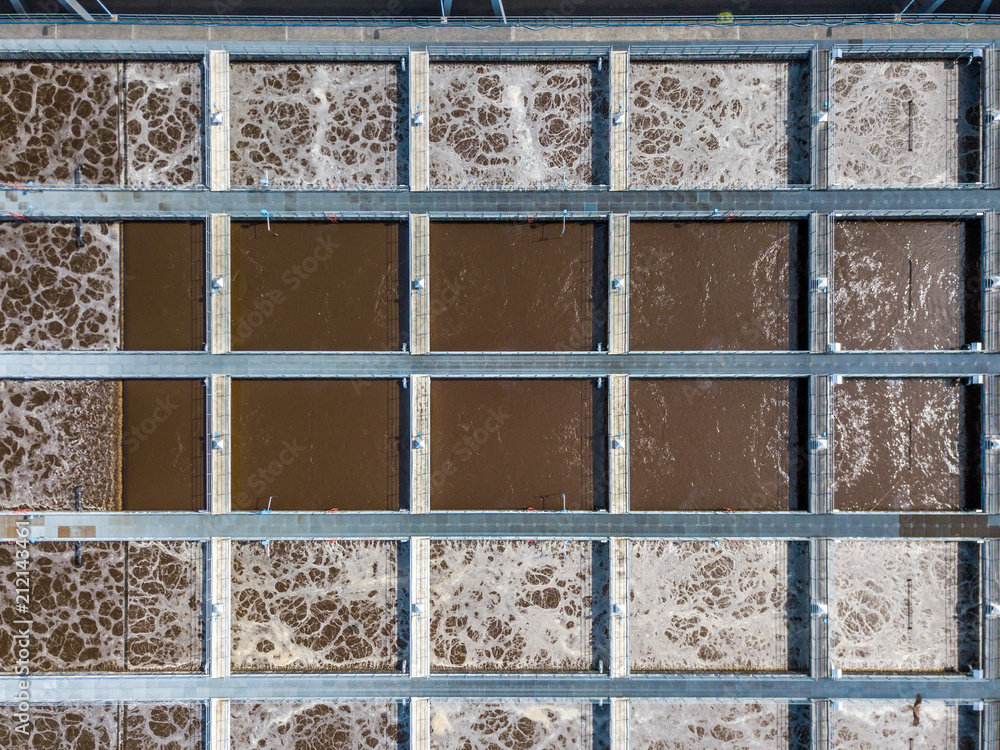 Aerial view of wastewater treatment plant with water pools in Europe Aerial view of wastewater treatment plant with water pools in Europe