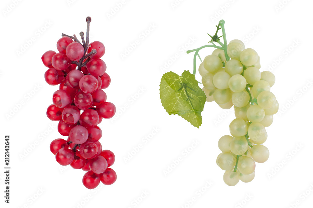 Fototapeta premium Artificial green and red grape isolated on white background