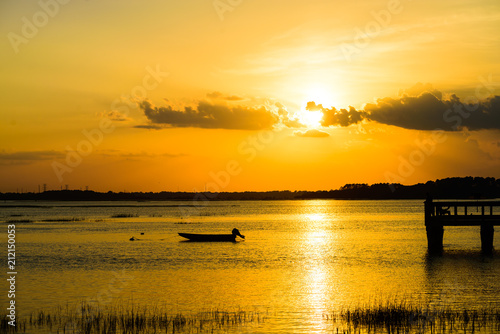 Small fishing boat at anchor ,Hilton Head Island SC, sunset.