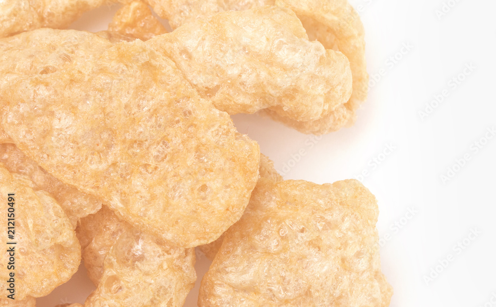 Crispy Pork Rinds Isolated on a White Background Crispy Pork Rinds Isolated on a White Background
