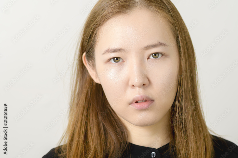 Portrait of a serious Asian businesswoman Portrait of a serious Asian businesswoman