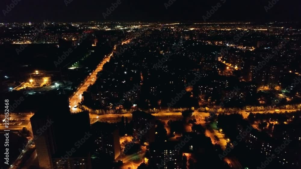 The flight above the picturesque night cityscape. time lapse, quadrocopter shot The flight above the picturesque night cityscape. time lapse, quadrocopter shot