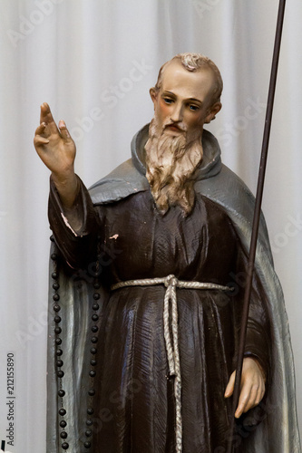 Pavia, Italy. 13 February 2017. A statue of a Franciscan friar in the Duomo di Pavia (Pavia Cathedral)