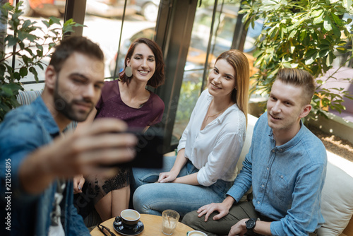 Friends at a coffee shop during a summer vacation