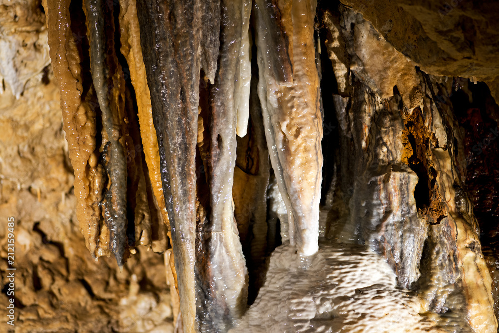 Stalactites inside Cave of the Mounds, a natural limestone cave located near Blue Mounds, Wisconsin, United States Stalactites inside Cave of the Mounds, a natural limestone cave located near Blue Mounds, Wisconsin, United States