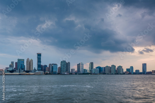 A view of the Jersey City skyline from Battery Park City, in Lower Manhattan, New York City © jonbilous