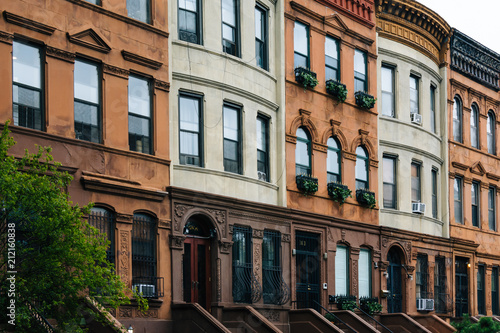 Colorful row houses in Harlem, Manhattan, New York City.