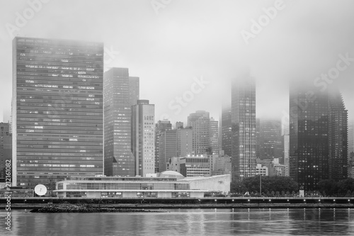 Foggy view of the Manhattan skyline from Gantry Plaza State Park  in Long Island City  Queens  New York City.