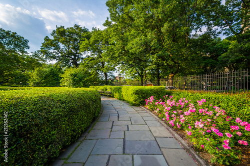 Walkway and flowers at the Conservatory Garden  in Central Park  Manhattan  New York City.