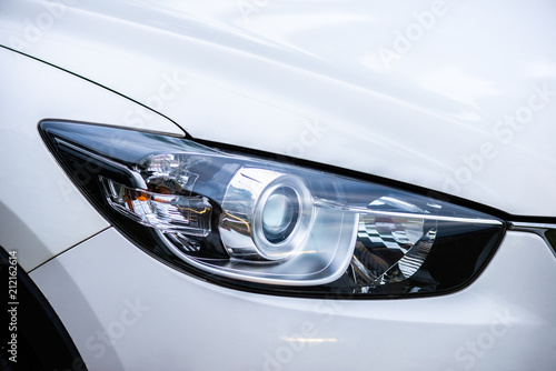 Closeup headlights of car © sirastock