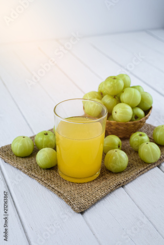 Indian gooseberry on wooden table