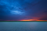 Empty floor with dramatic sunset sky , Horizontal format .