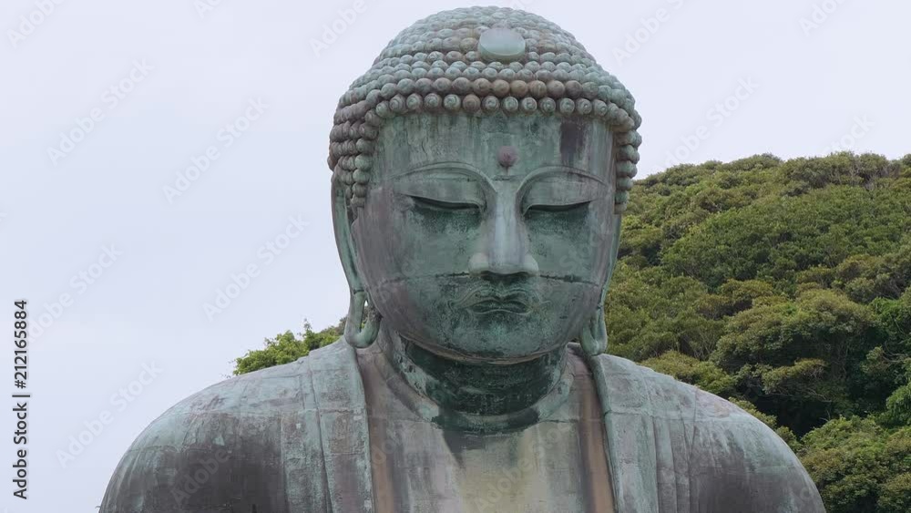 World famous Daibutsu Buddha - the Great Buddha Statue in Kamakura - TOKYO / JAPAN - JUNE 12, 2018 World famous Daibutsu Buddha - the Great Buddha Statue in Kamakura - TOKYO / JAPAN - JUNE 12, 2018