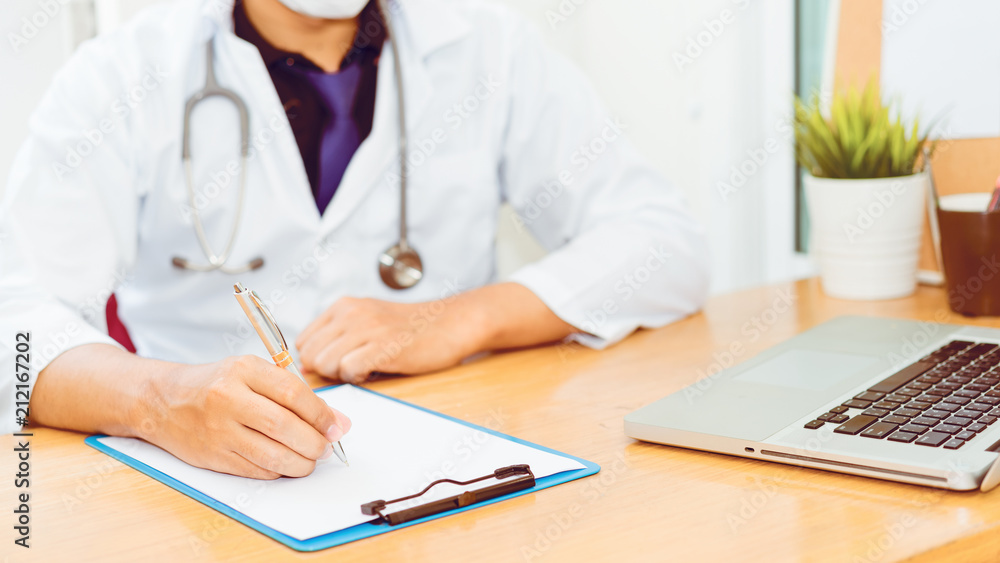 Medical concept.The doctor is checking the patient pulse.Health check.The doctor touches the patient's hand to measure the heartbeat. Medical concept.The doctor is checking the patient pulse.Health check.The doctor touches the patient's hand to measure the heartbeat.