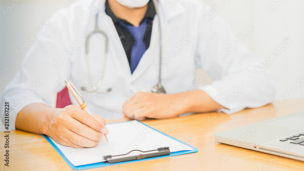 Medical concept.The doctor is checking the patient pulse.Health check.The doctor touches the patient's hand to measure the heartbeat. Medical concept.The doctor is checking the patient pulse.Health check.The doctor touches the patient's hand to measure the heartbeat.