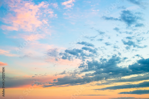 Beautiful colors sunset clouds sky background.Evening colorful clouds,sunlight with dramatic sky on blue background.Natural photo landscape for website and page.