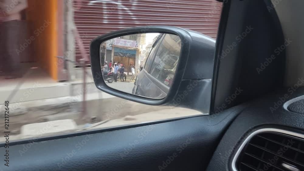 Driving around the streets of Kathmandu. Mirror view footage. Driving around the streets of Kathmandu. Mirror view footage.