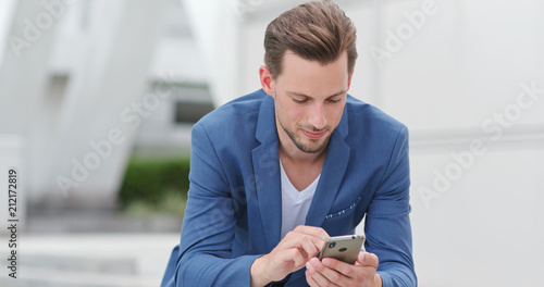 Photography Caucasian Businessman use of mobile phone