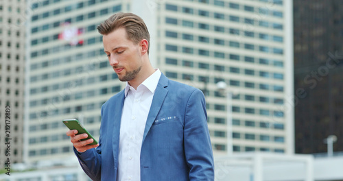 Photography Businessman work on smart phone in city