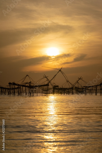 Square dip net sunrise moment phattalung Thailand © khobenz