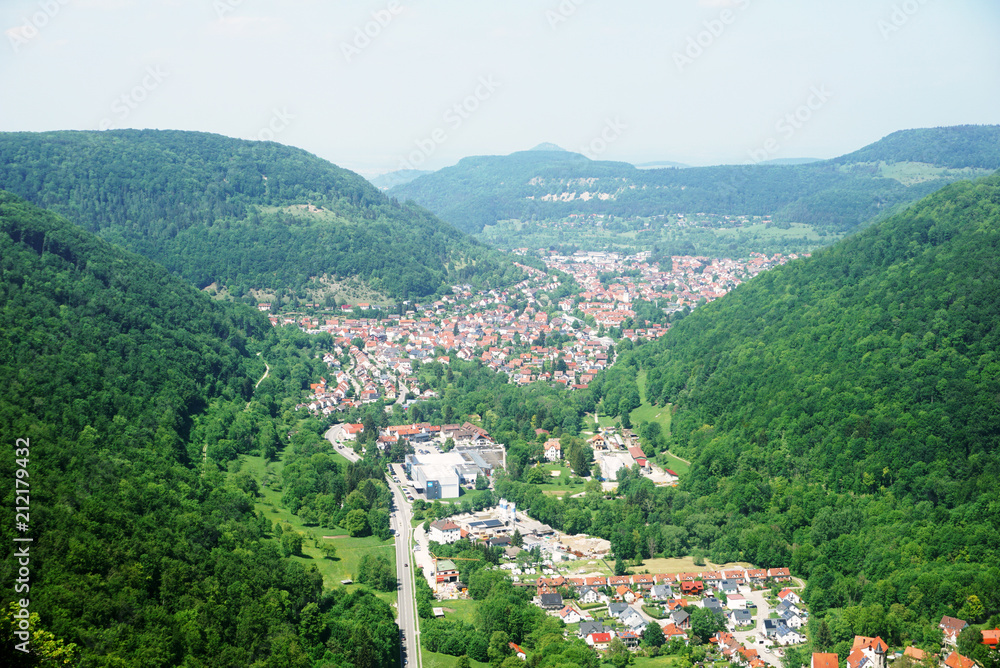 Fototapeta premium Top view of the german village Honau and mountains. View from the castle Liechtenstein. Baden-Wuerttemberg, Germany.