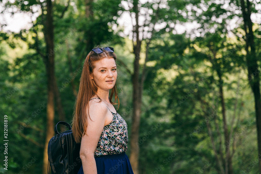 Smiling girl in the green summer park Smiling girl in the green summer park