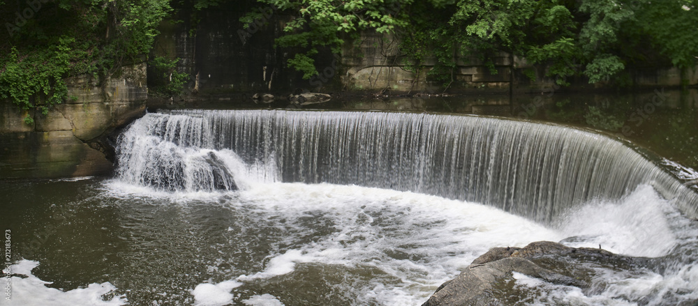 Fototapeta premium Round Falls Semi Circular Man-Made Waterfall in Downtown Baltimore, Maryland USA