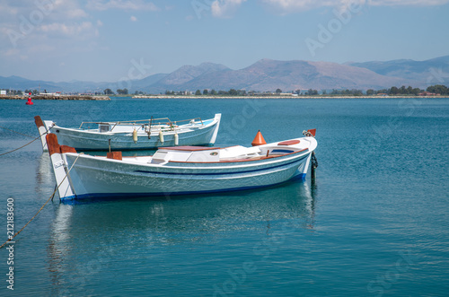 small Fishing Boats on shore of Lagoon. Greece