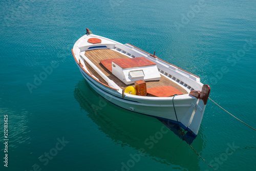 small Fishing Boat on shore of Lagoon. Greece